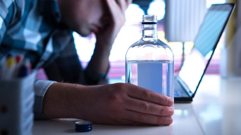 person struggling with alcohol